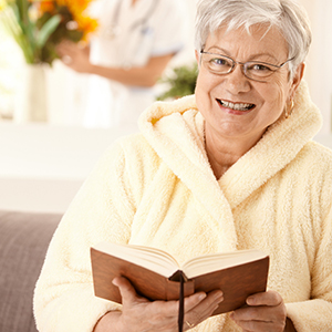 image of senior reading a book